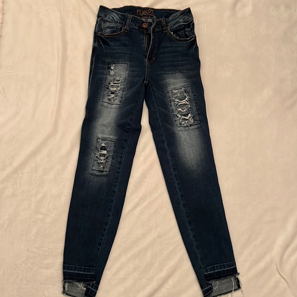 Dark blue ripped jeans